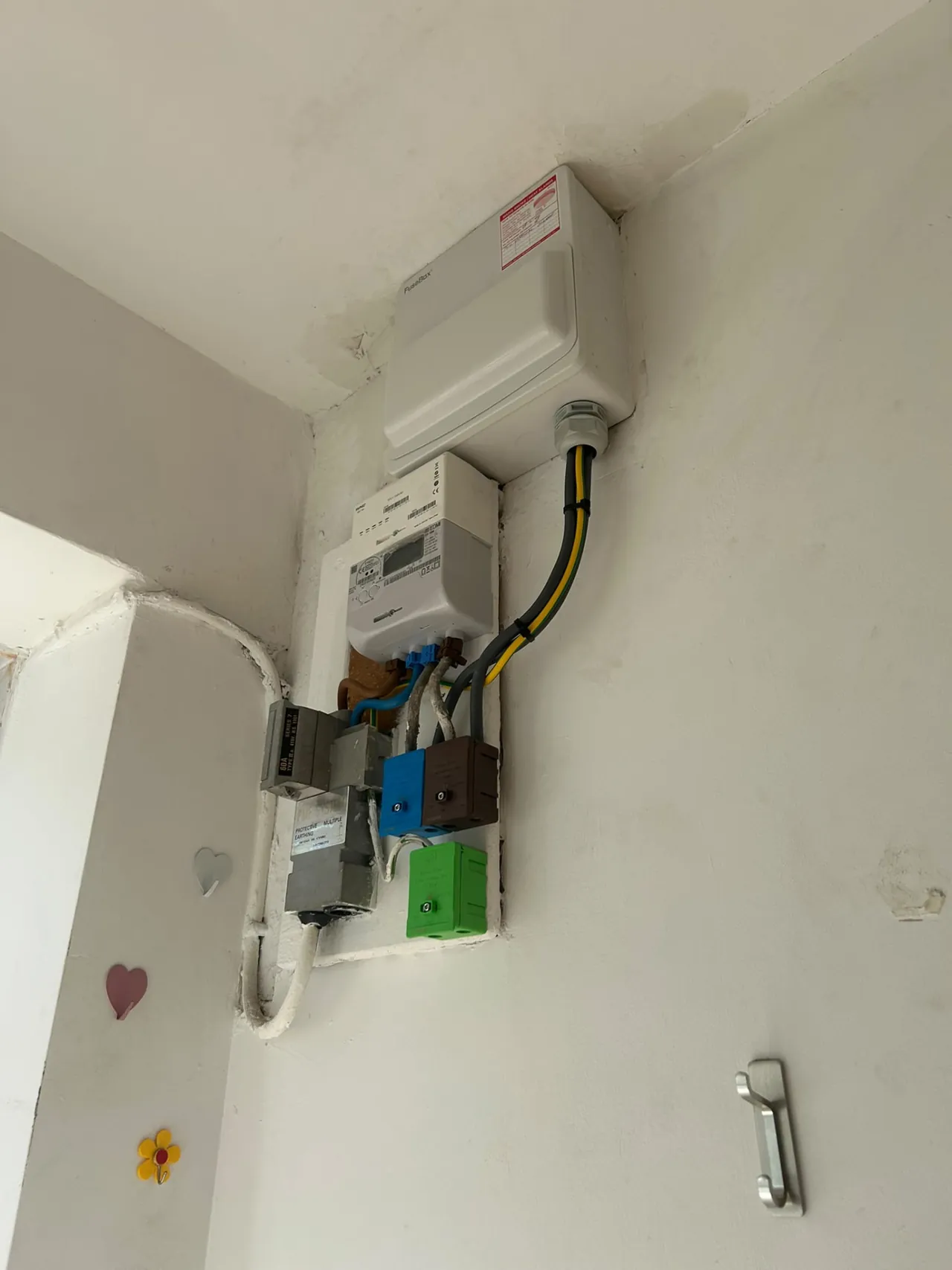 New consumer unit and isolator with tidy wiring at the main electrical intake