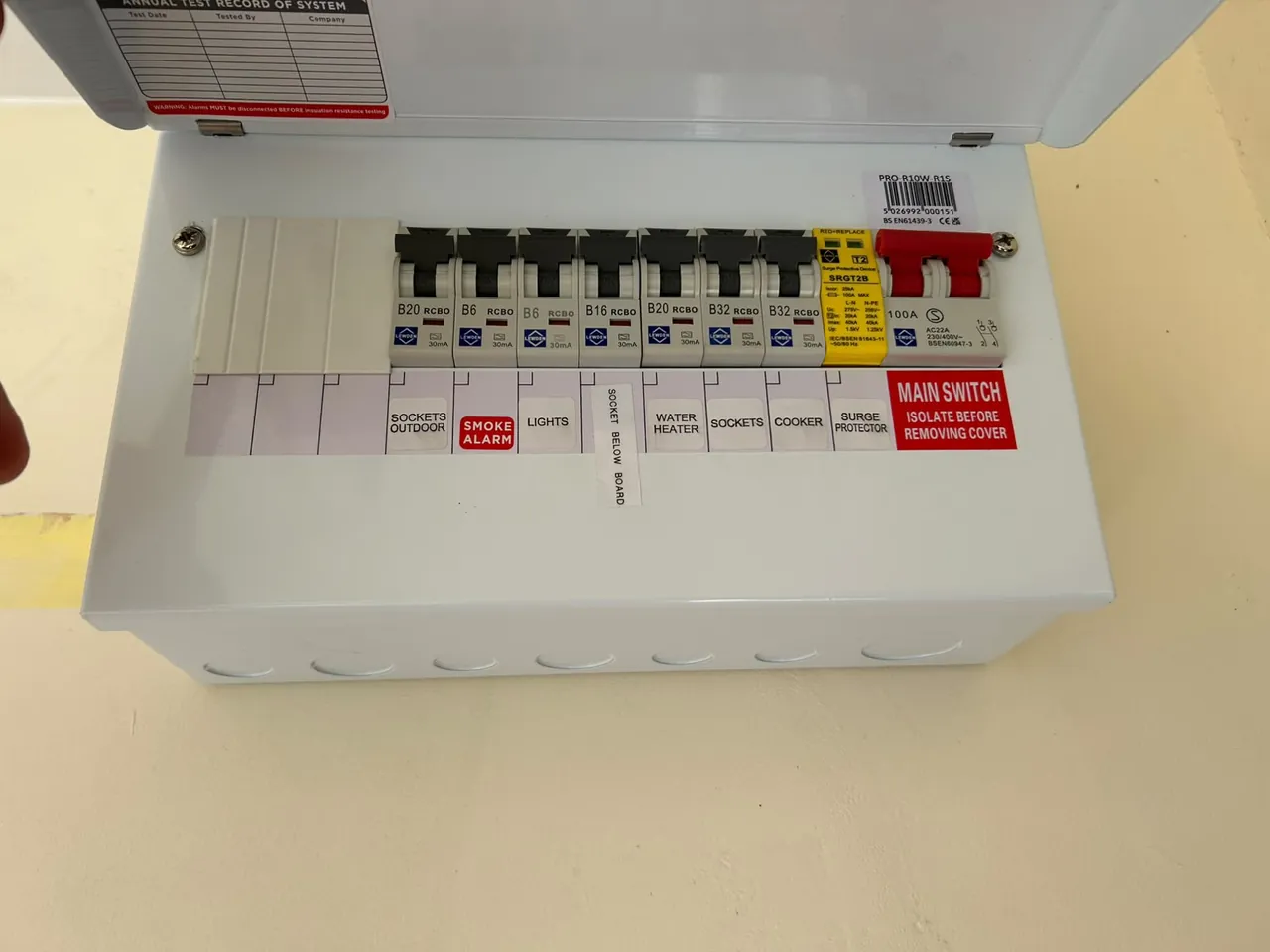 Close-up of a new consumer unit with surge protection and clearly labelled circuits