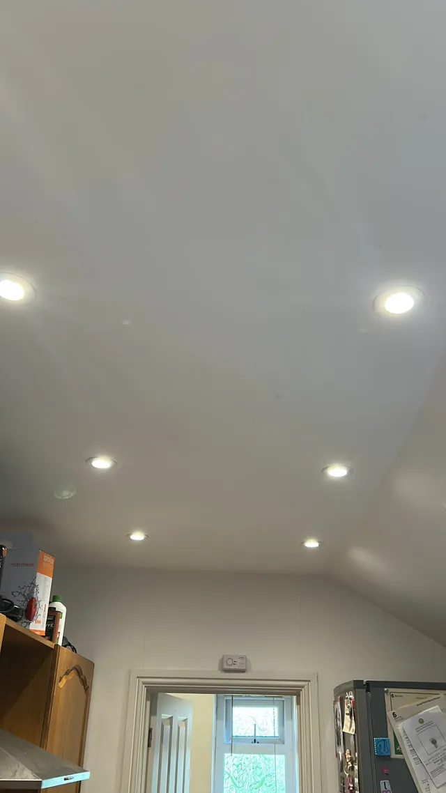 Recessed LED downlights installed across a newly finished ceiling
